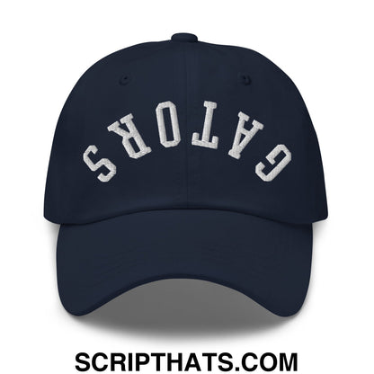 Navy blue unstructured dad hat with white embroidered gators lettering in an arched design front view
