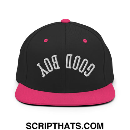 Black snapback hat with vibrant pink flat bill brim and white good boy embroidered lettering on front panel