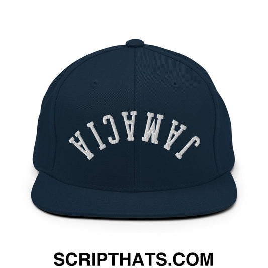 Navy blue snapback hat with white embroidered jamaica lettering and flat bill brim in upside down design
