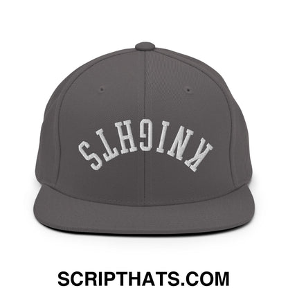Gray snapback cap with white embroidered knights lettering in an arched design and flat bill brim