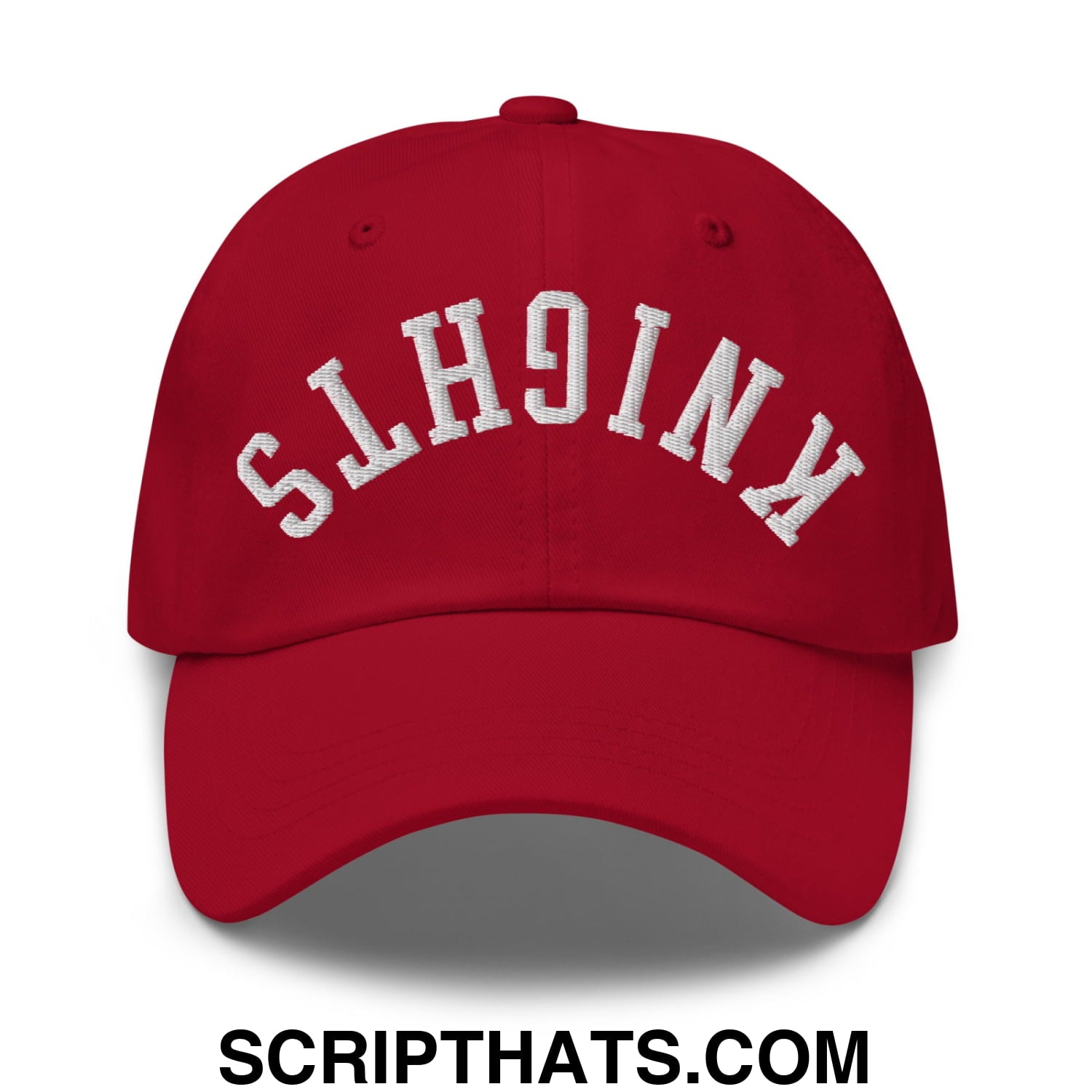 Red unstructured dad hat with white embroidered knights lettering in an arched design