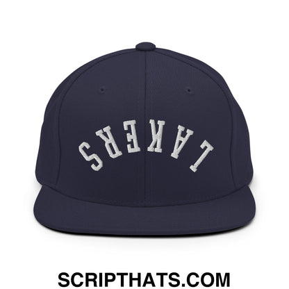 Navy blue snapback cap with white embroidered upside down lakers lettering and flat bill brim design
