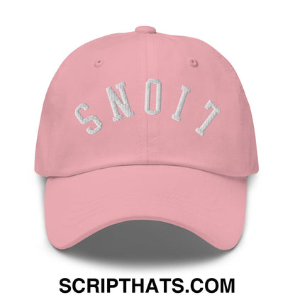 A soft pink unstructured dad hat with white upside down lions embroidered lettering spelling snoit in an arched design