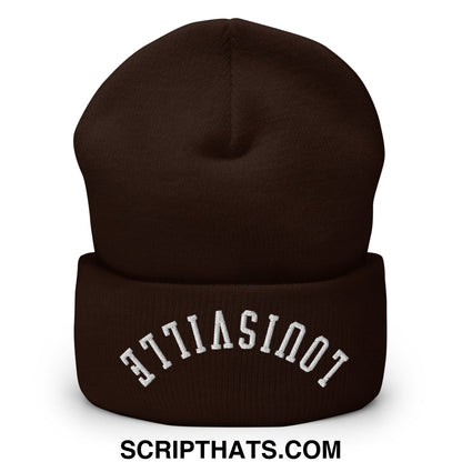 A dark brown knit beanie with a folded cuff embroidered with white arched lettering reading ettiasinot