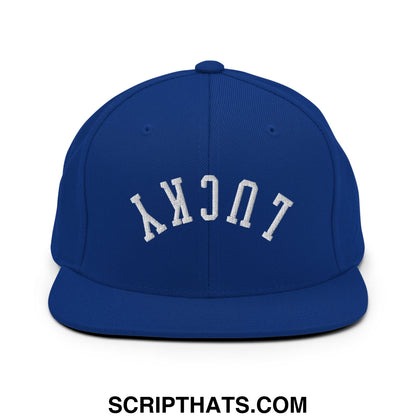 Royal blue snapback cap with white embroidered lucky lettering in a classic arched design flat bill brim hat