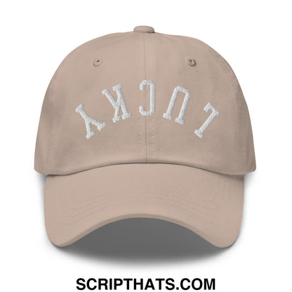 Beige unstructured dad hat with white embroidered lucky arch on front in upside down lucky design