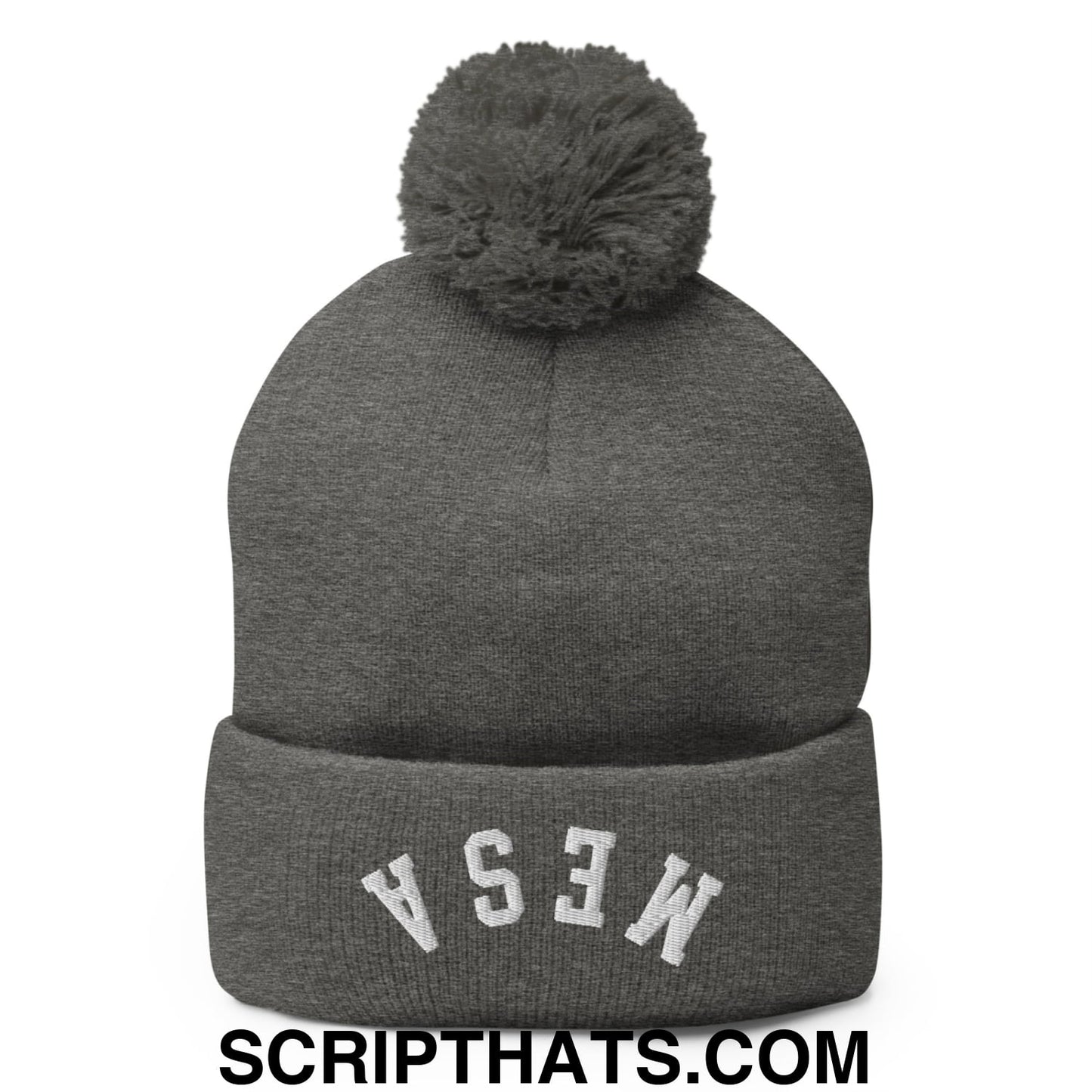 Gray knit beanie with matching fuzzy pom pom and white embroidered mesa lettering on the cuff