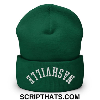 A dark green knit cuffed beanie with a folded cuff and white embroidered nashville text on the front