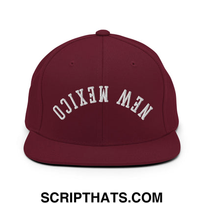 Maroon flat bill snapback hat with white embroidered new mexico text in an arched design perfect for casual wear