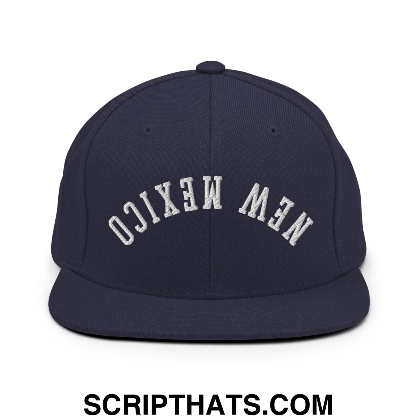 Navy blue snapback hat with white embroidered new mexico lettering and flat bill brim in an upside down style