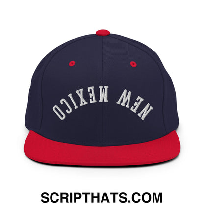 Navy blue and red snapback cap with white embroidered new mexico lettering and flat bill brim
