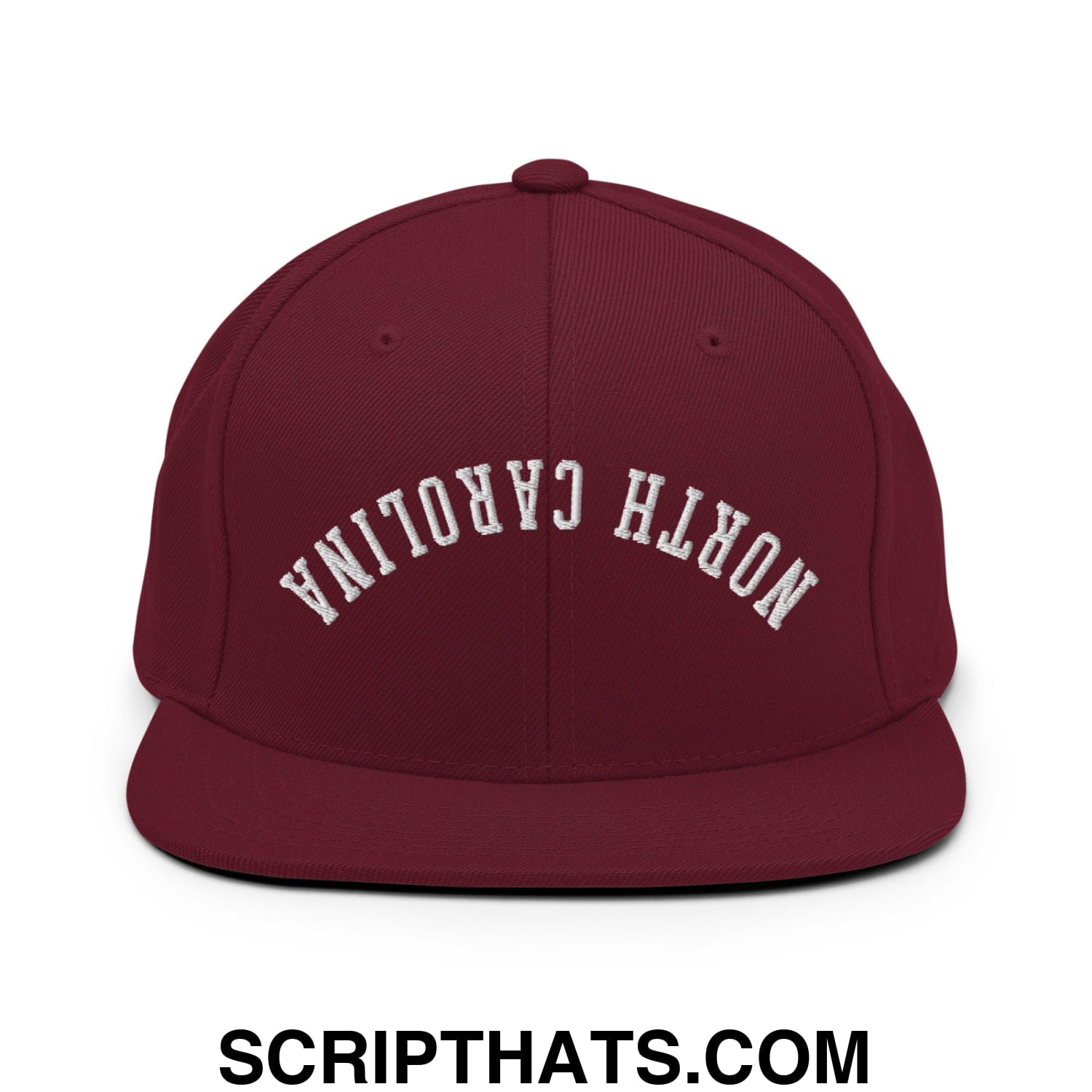 Maroon snapback hat with white embroidered north carolina text in an arched design and flat bill brim