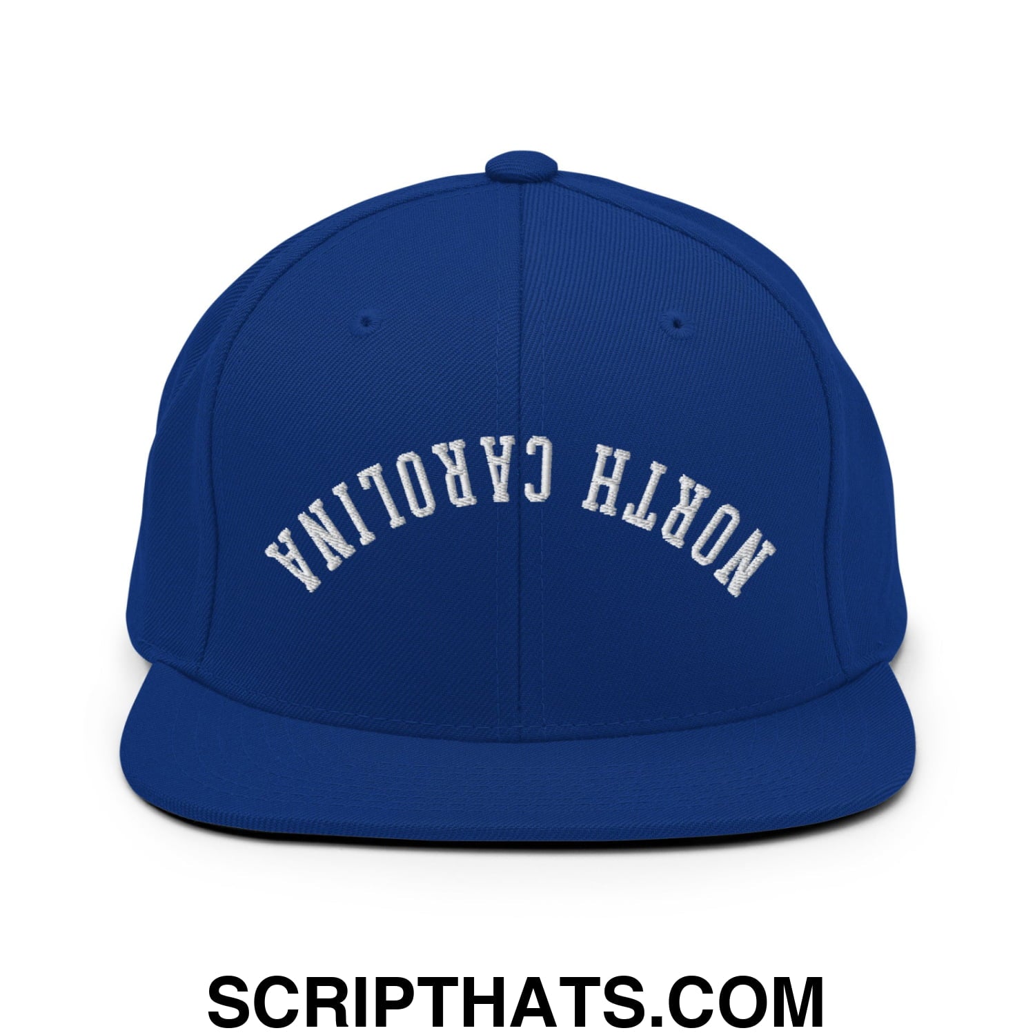 Royal blue snapback hat with white embroidered north carolina lettering and flat bill brim design