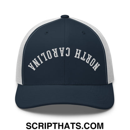 Navy blue and white mesh trucker hat with north carolina embroidered in textured white lettering across front