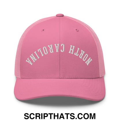 Pink mesh trucker hat with white embroidered north carolina lettering and upside down design across the front