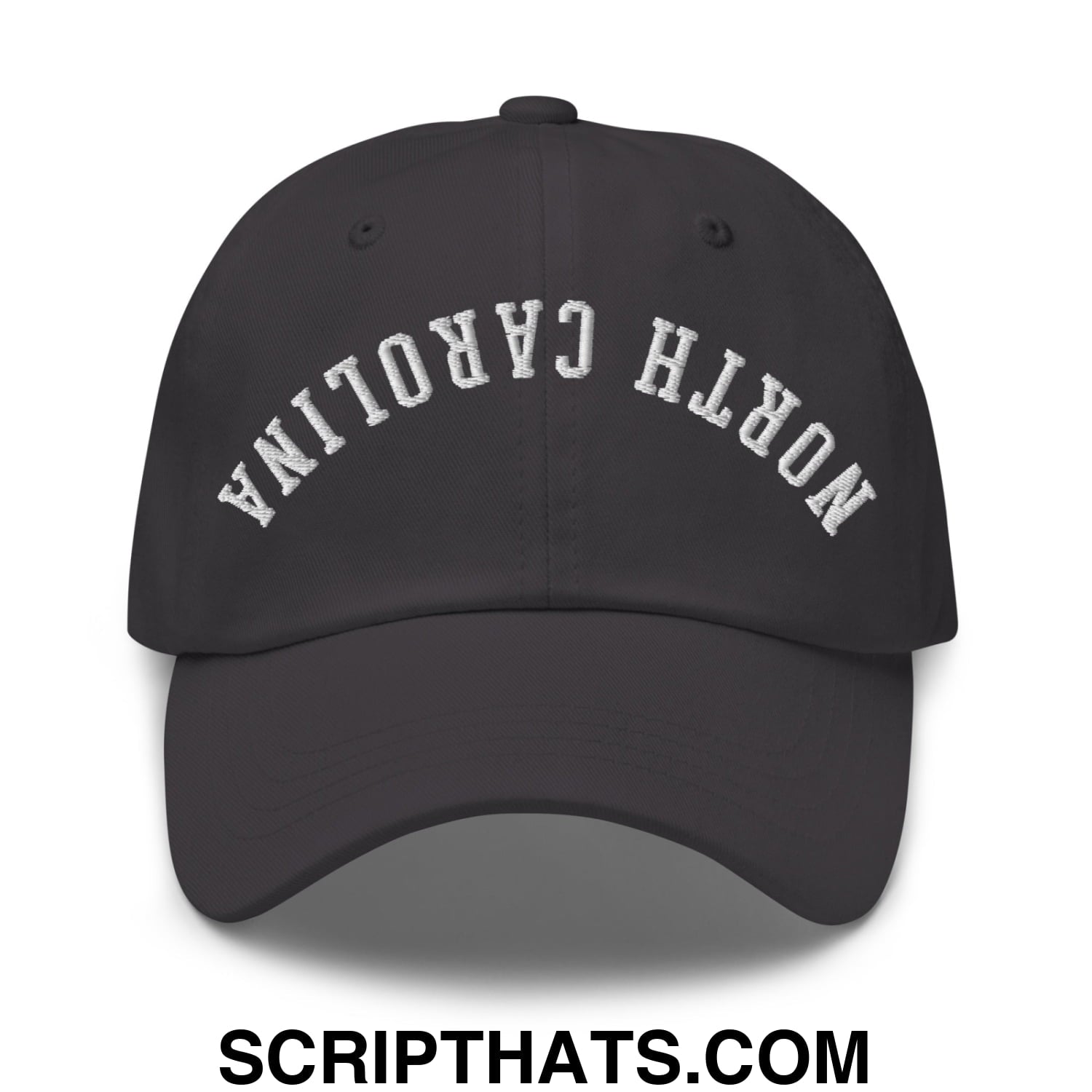Black unstructured dad hat with white embroidered north carolina text in an arched design titled upside down north carolina hat