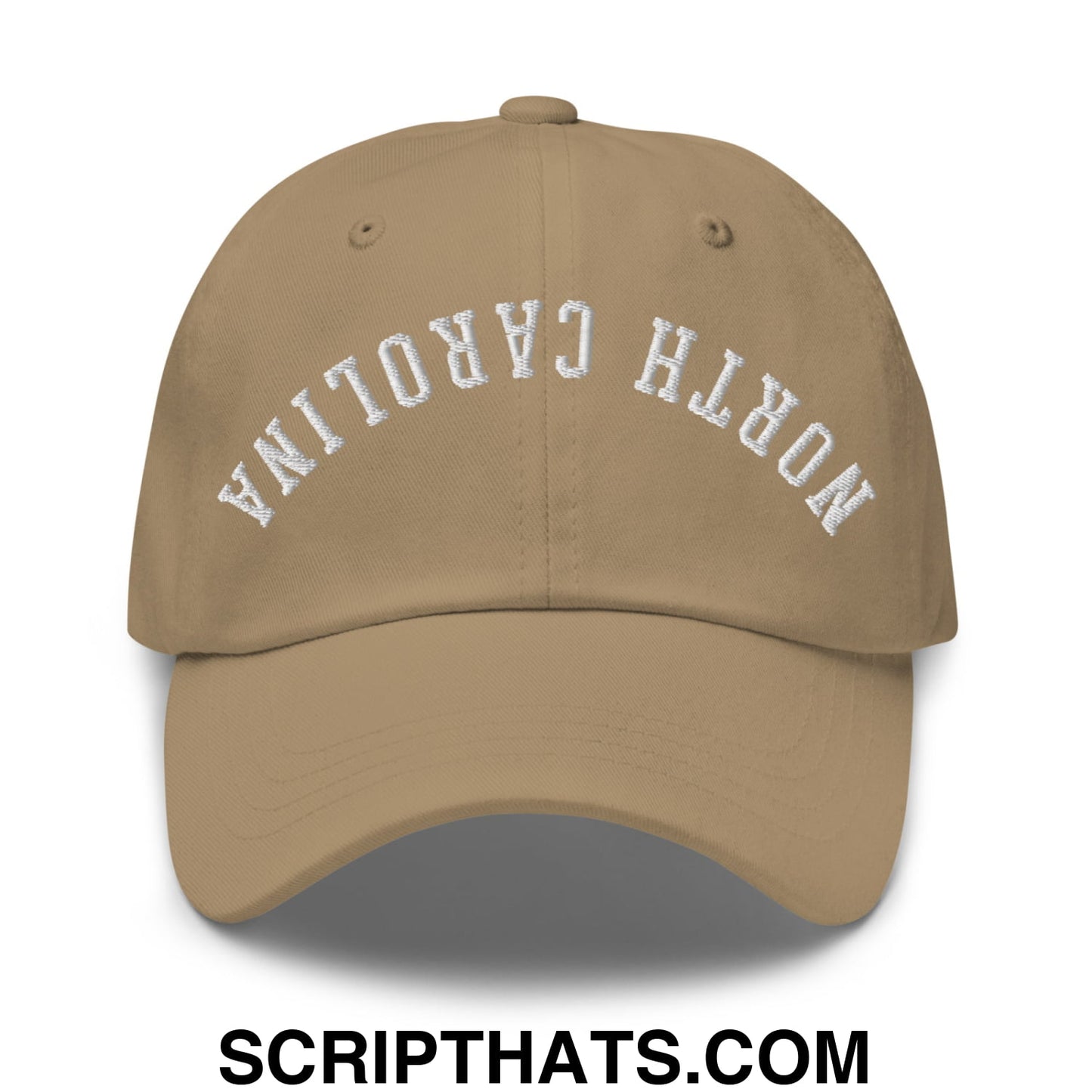 Beige unstructured dad hat with white embroidered north carolina arch on front in upside down design