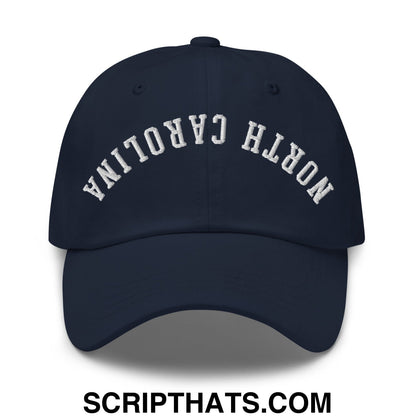 Navy blue unstructured dad hat with white embroidered north carolina arch on front panel