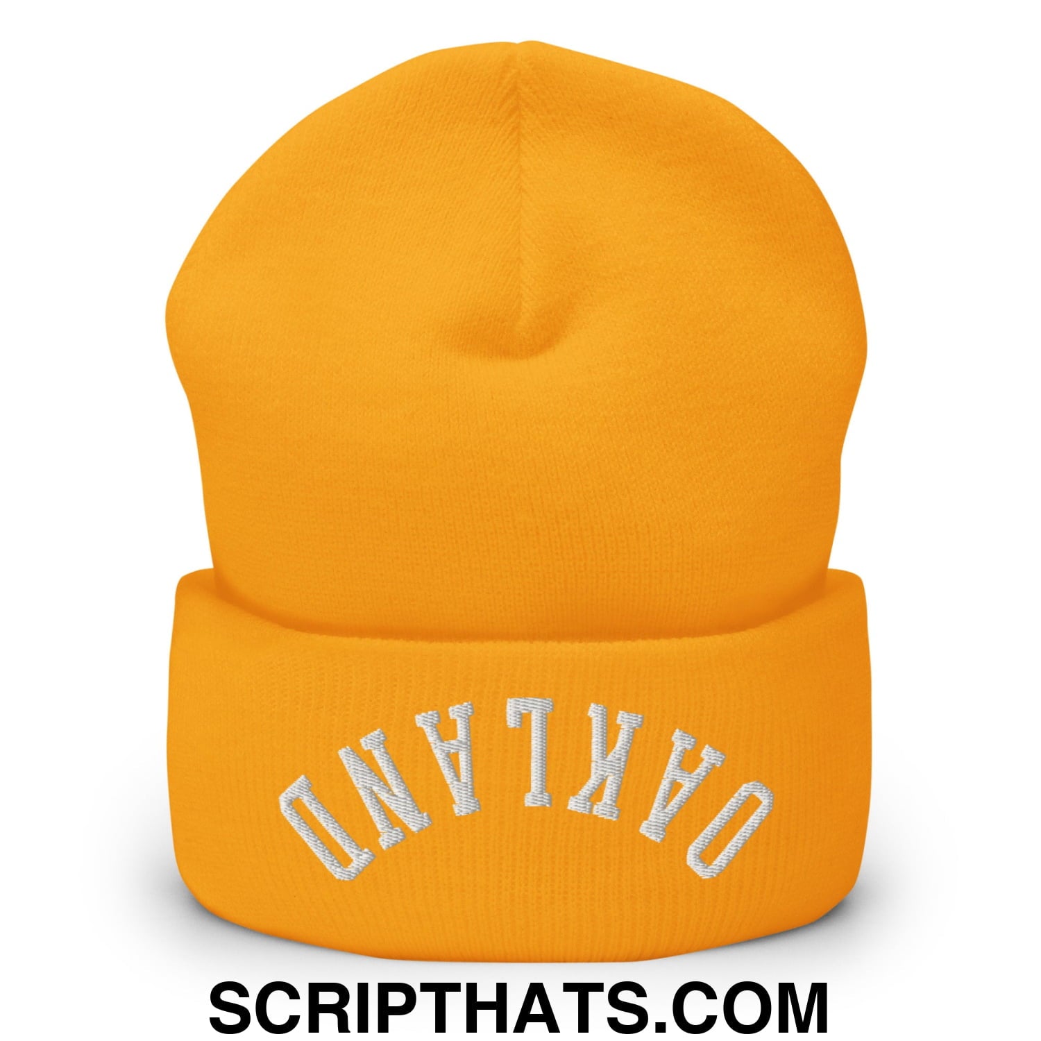 A vibrant orange knit beanie with oakland embroidered in white on the folded cuff called upside down oakland beanie