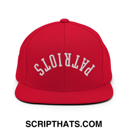 Red snapback cap with white embroidered patriots lettering and flat bill brim in an upside down design