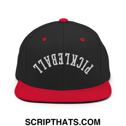 Black and red snapback cap with white pickleball embroidered in arched lettering upside down pickleball flat bill hat