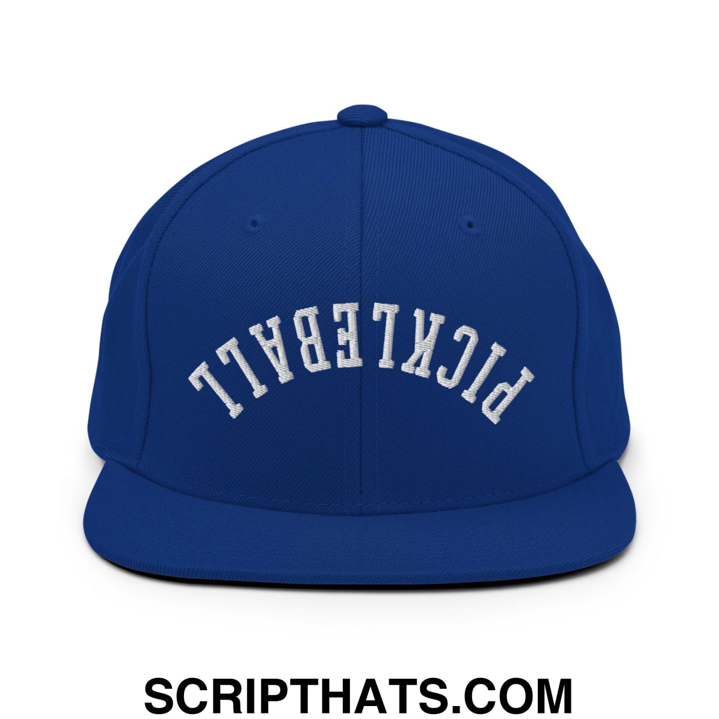 Royal blue snapback hat with flat bill brim and white embroidered pickleball lettering in an arched design
