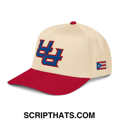 Cream-colored baseball snapback hat with red brim embroidered blue uc logo and puerto rican flag patch on side
