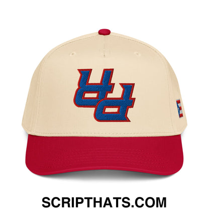 Beige and red baseball snapback hat with embroidered blue UC logo and Puerto Rican flag patch for casual wear