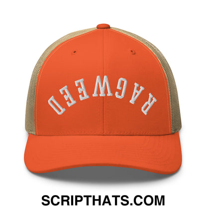 Orange and beige mesh trucker hat with white embroidered ragweed lettering upside down on the front panel