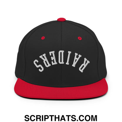 Black and red snapback hat with upside down raiders embroidered white lettering and flat bill brim