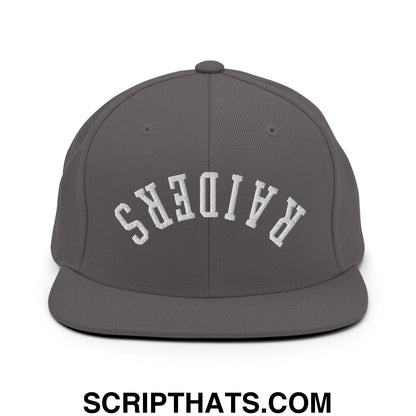 Gray snapback cap with white embroidered raiders lettering in an arched design and flat bill brim