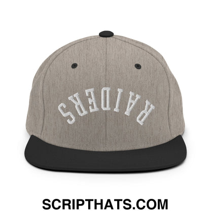 Gray heather snapback cap with black flat brim and white embroidered Raiders lettering in upside down design