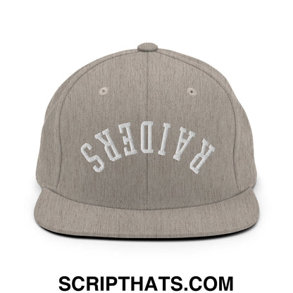 Gray heathered snapback cap with white embroidered raiders lettering and flat bill brim in upside down style