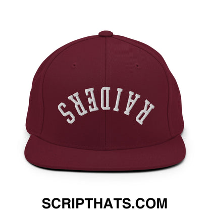 Maroon snapback cap with white embroidered upside down raiders lettering and flat bill brim design