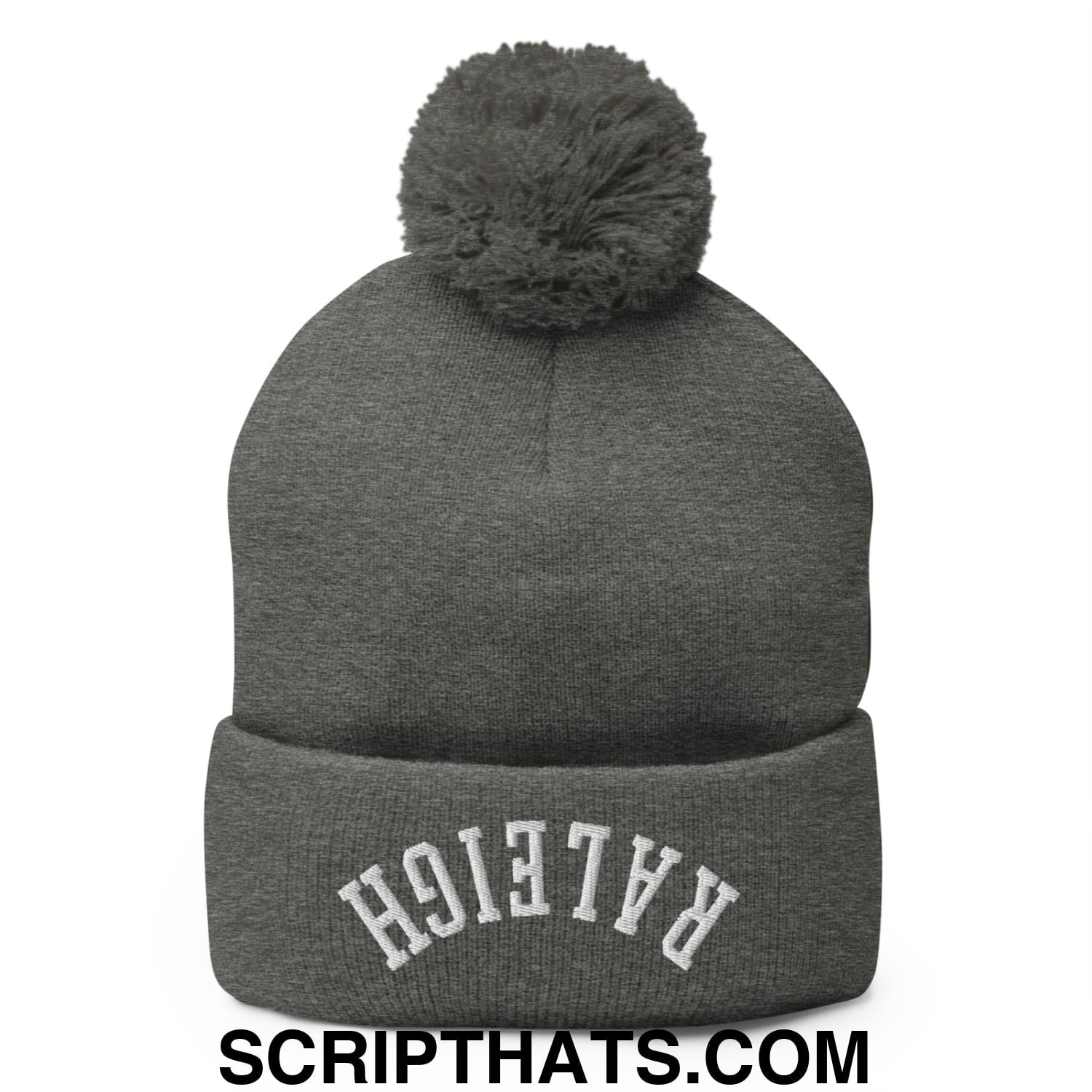 Gray knit beanie with a fuzzy pom pom and white embroidered raleigh arch on the folded cuff