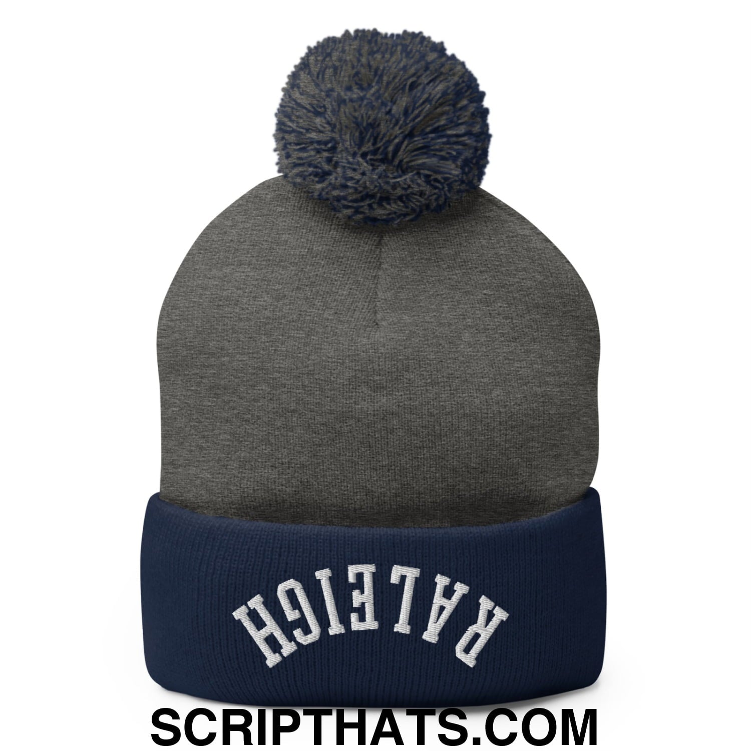 Gray knit beanie with navy blue cuff white embroidered upside down raleigh lettering and matching gray pom pom