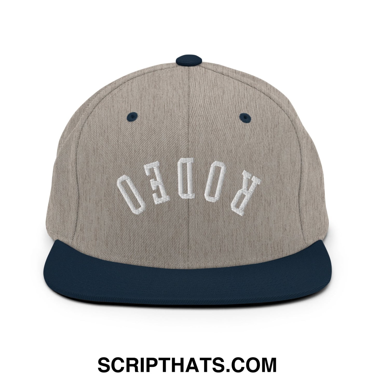 A gray and navy blue snapback hat with upside down rodeo embroidered in white on a flat bill brim