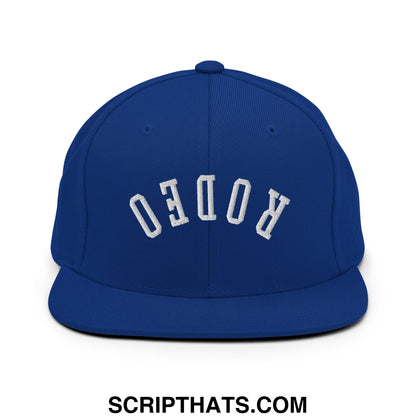Royal blue snapback cap with white embroidered rodeo lettering and flat bill brim for casual streetwear