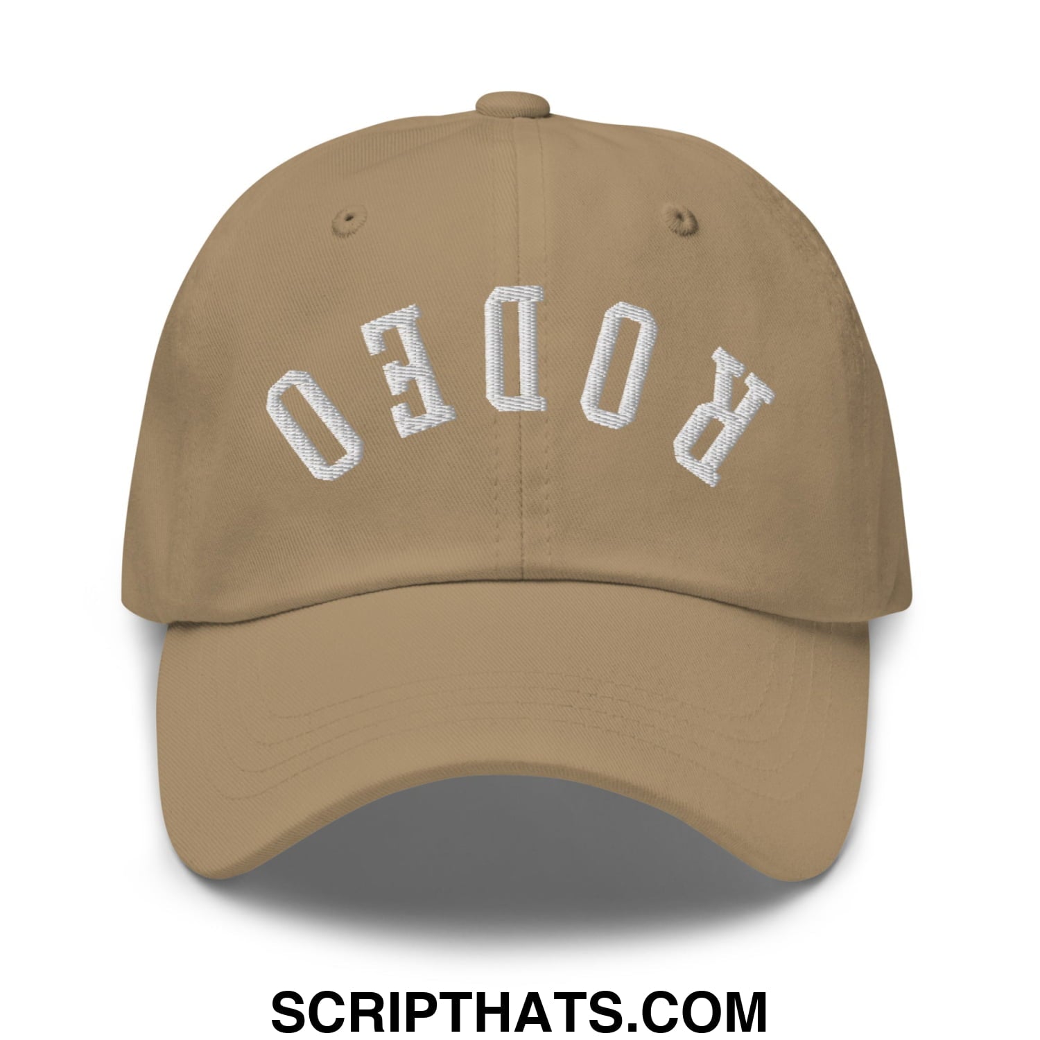 Tan unstructured dad hat with white embroidered rodeo lettering in an arched design titled upside down rodeo embroidered