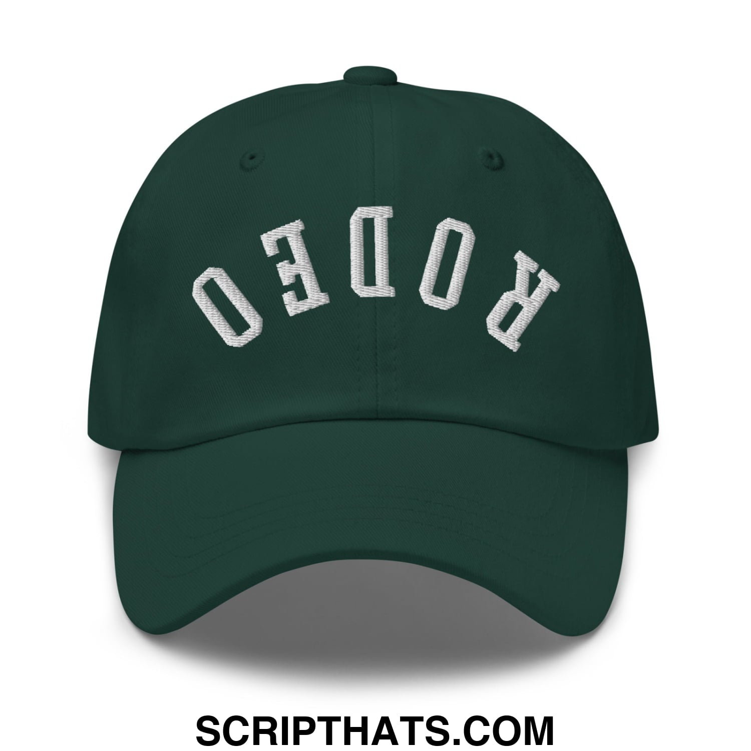 Dark green unstructured dad hat with white embroidered rodeo lettering in an arched design and upside down style