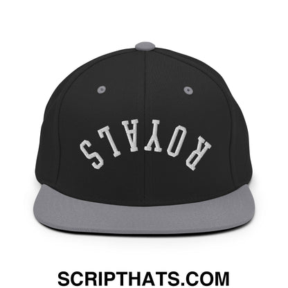 Black and gray snapback cap with white embroidered royals lettering and a flat bill brim design