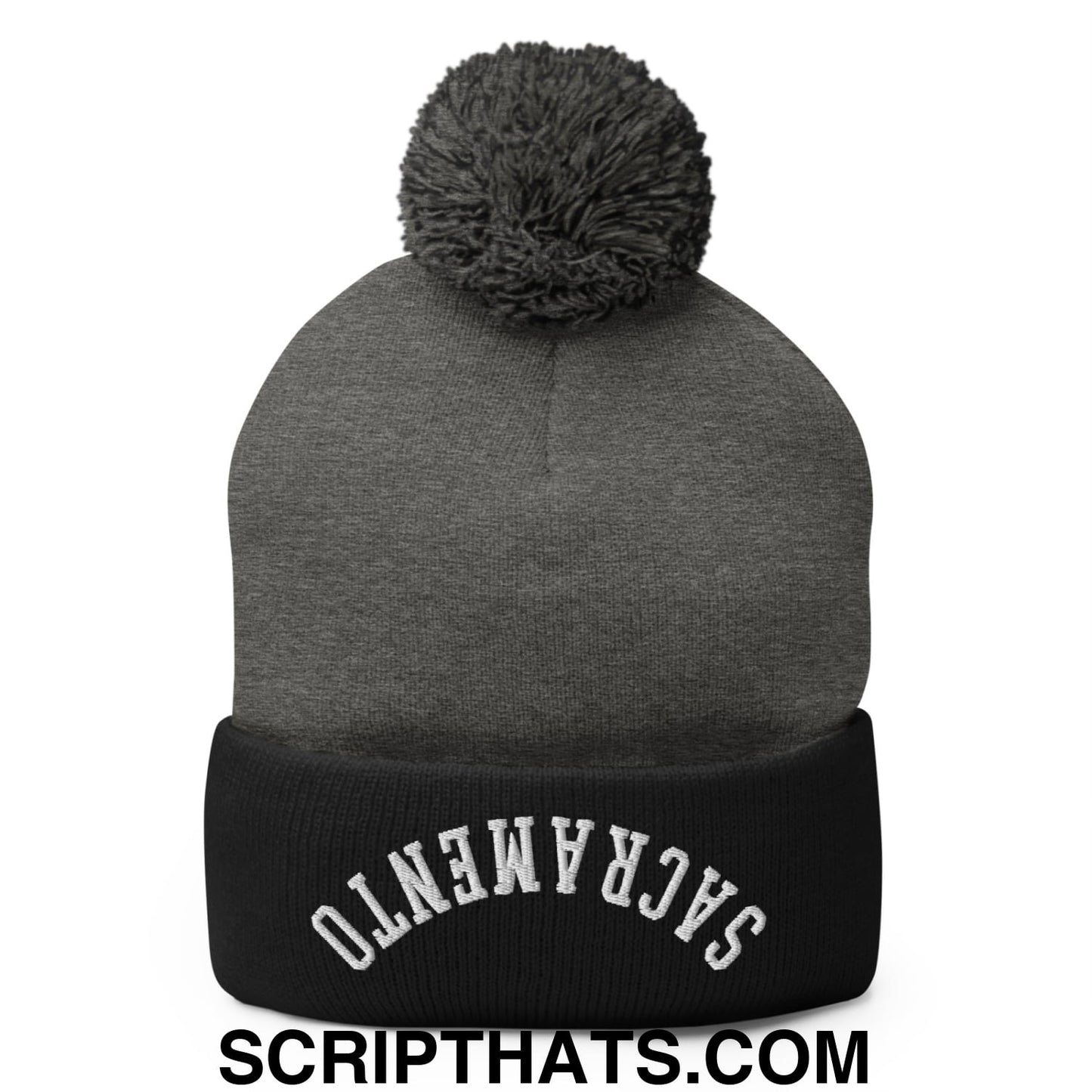 Gray knit beanie with black ribbed cuff featuring white embroidered Sacramento and gray pom pom on top