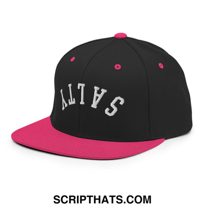Black and pink snapback cap with white embroidered salty lettering and a flat bill brim design