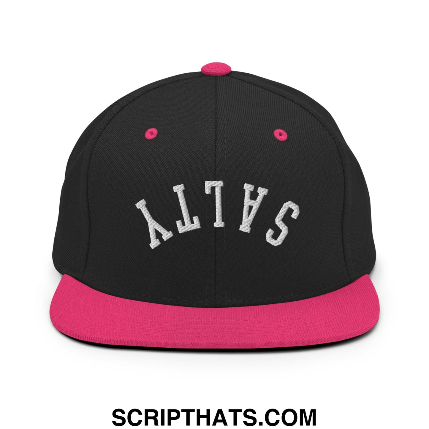 Black snapback hat with pink flat bill brim and button featuring white embroidered salty lettering in an arched design