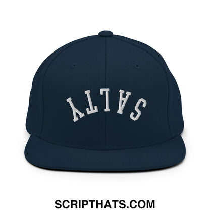 Navy blue snapback hat with white arched salty embroidery and flat bill brim perfect for casual wear