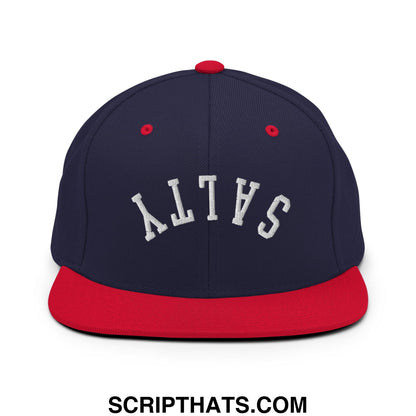 Navy blue and red snapback hat with white embroidered salty lettering and a flat bill brim design