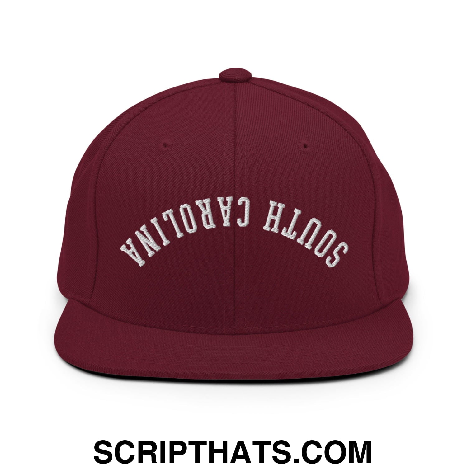 Maroon flat bill brim snapback hat with white embroidered south Carolina lettering in upside down design