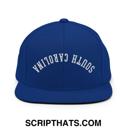 Royal blue snapback hat with white embroidered south Carolina lettering and flat bill brim design