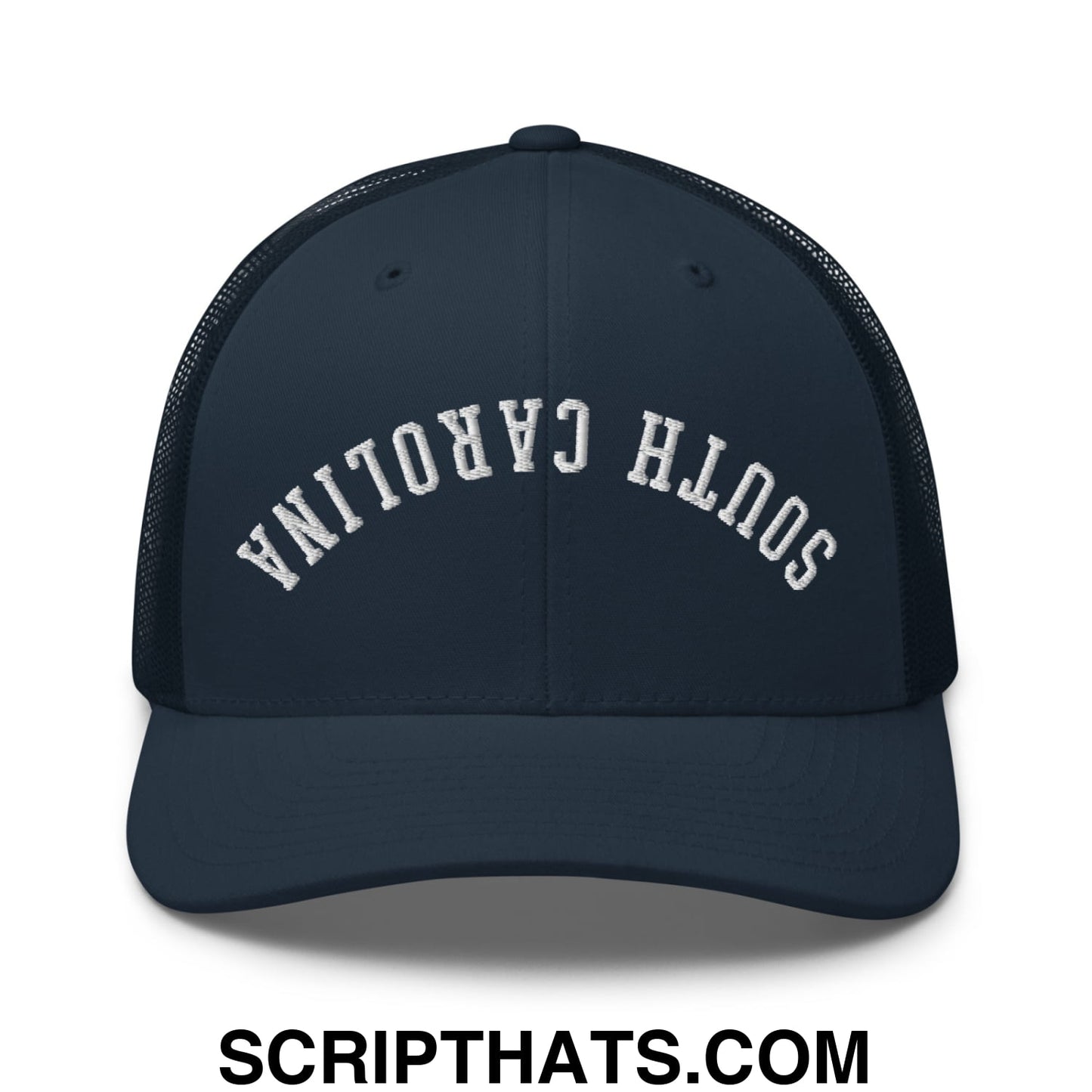 Navy blue mesh trucker hat with white embroidered south carolina lettering upside down on the front panel