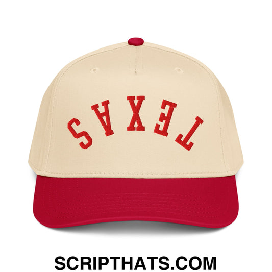 Cream-colored baseball snapback hat with red embroidered texas lettering and matching red brim
